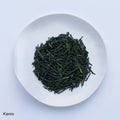 Ippodo Tea Kanro Gyokuro shade-grown Japanese green tea leaves on white plate