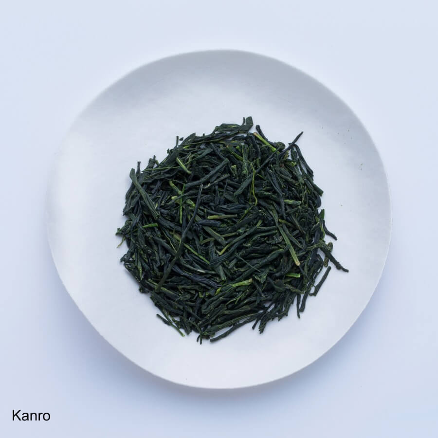 Ippodo Tea Kanro Gyokuro shade-grown Japanese green tea leaves on white plate
